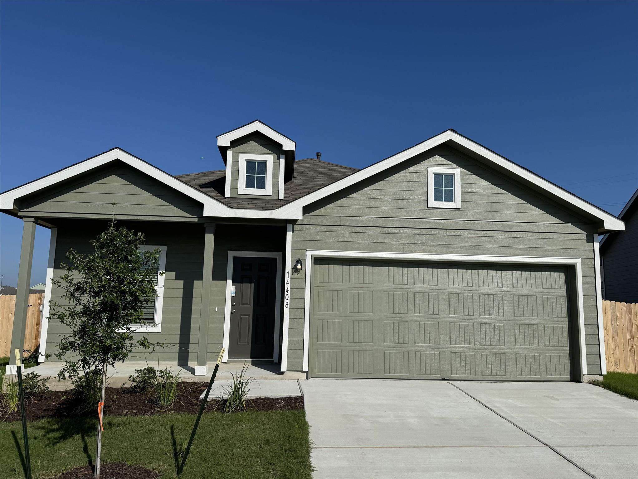 A newly constructed residence features an attache