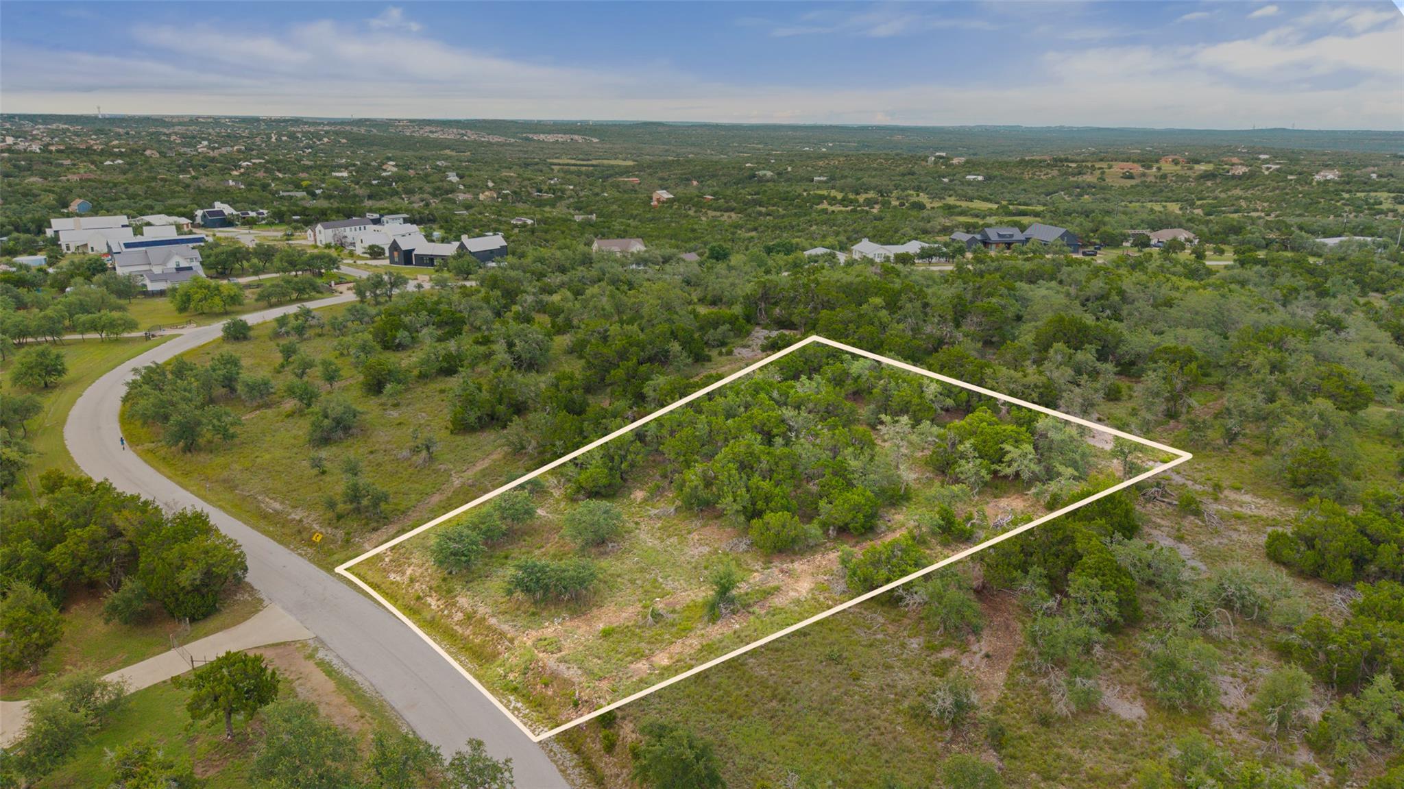 A spacious lot offering abundant green space and 