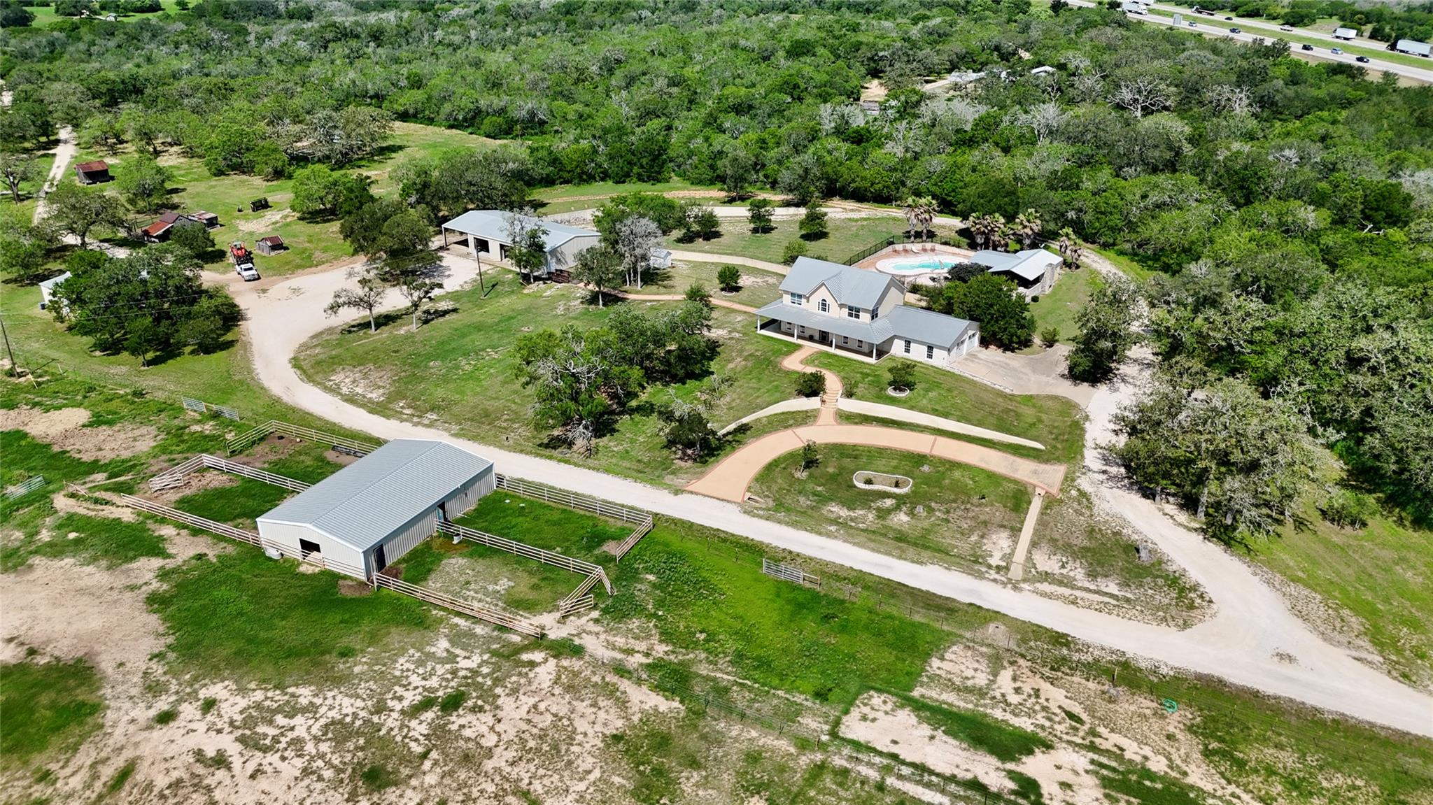 An aerial panorama reveals a private oasis, blend