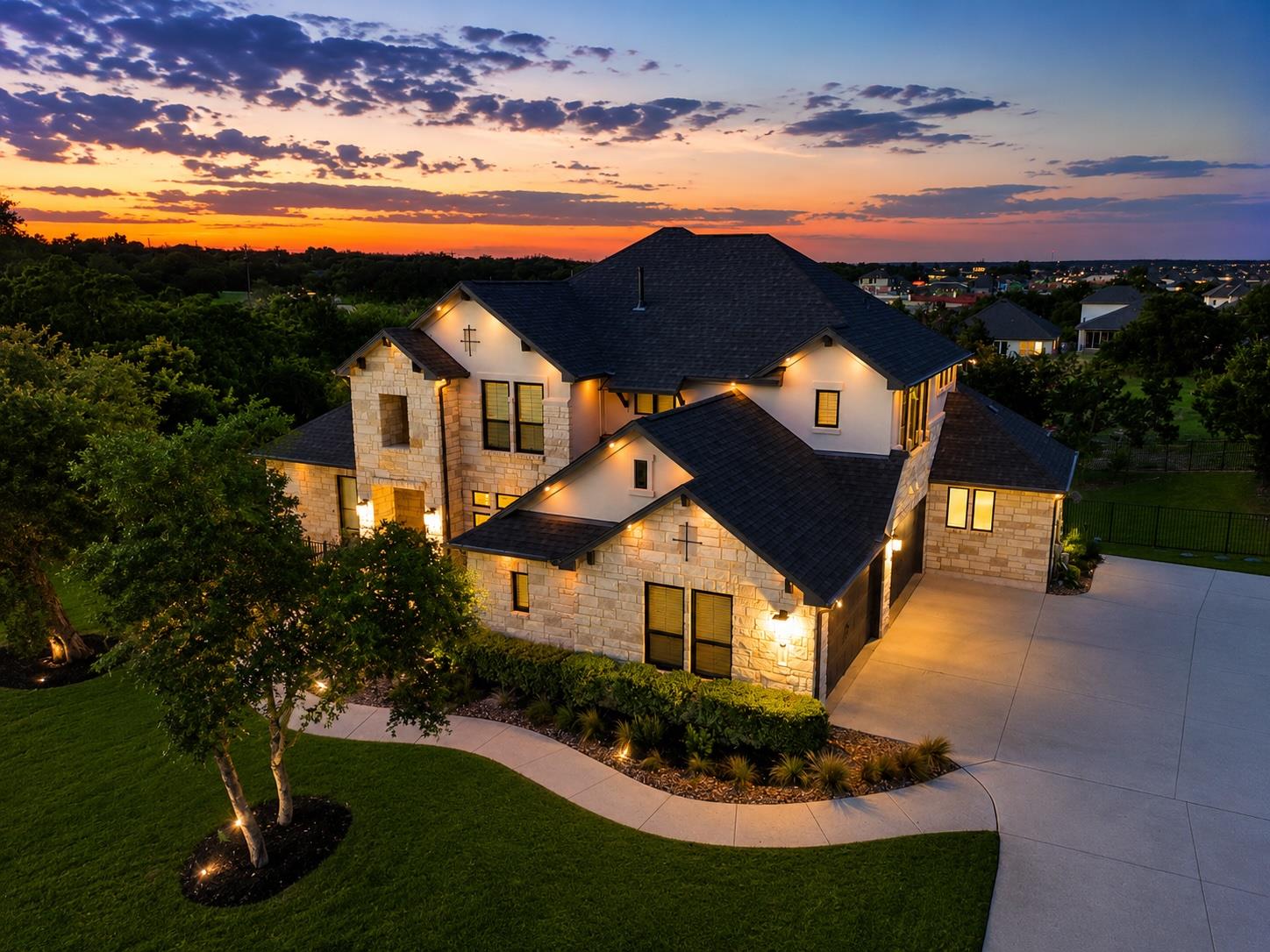 An inviting stone and stucco residence awaits, il