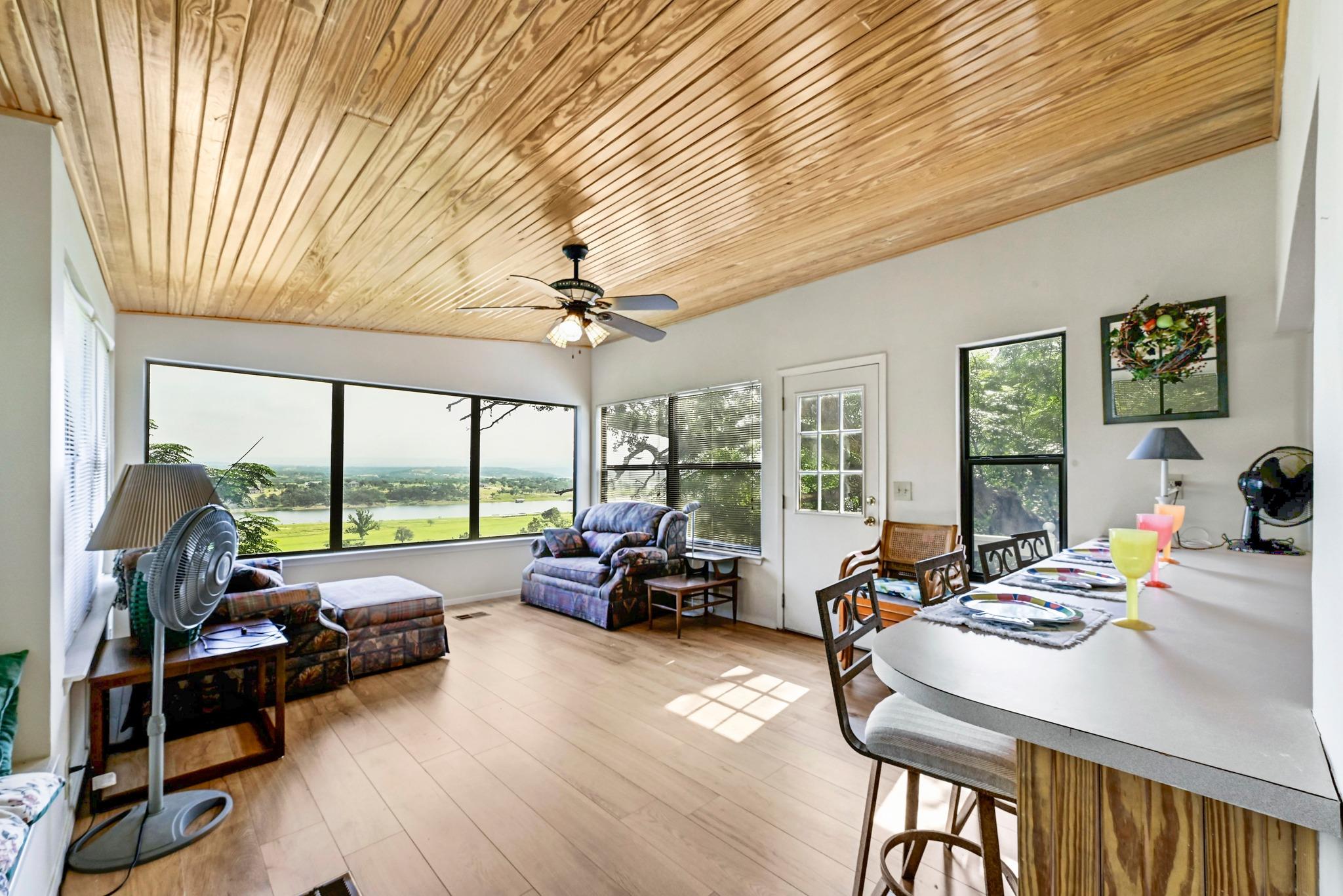 Panoramic windows frame sweeping views of the sur
