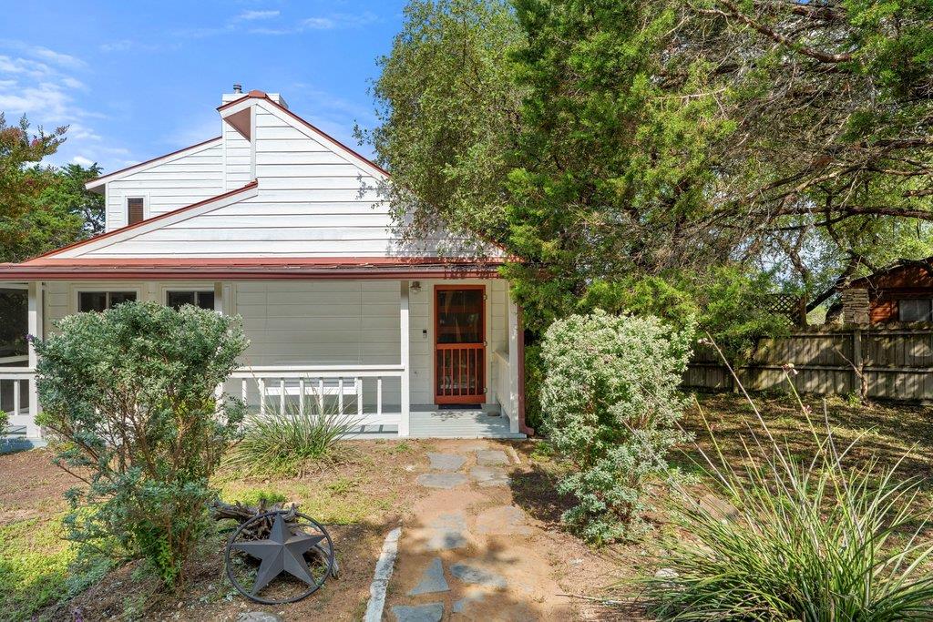 A charming cottage facade welcomes visitors with 