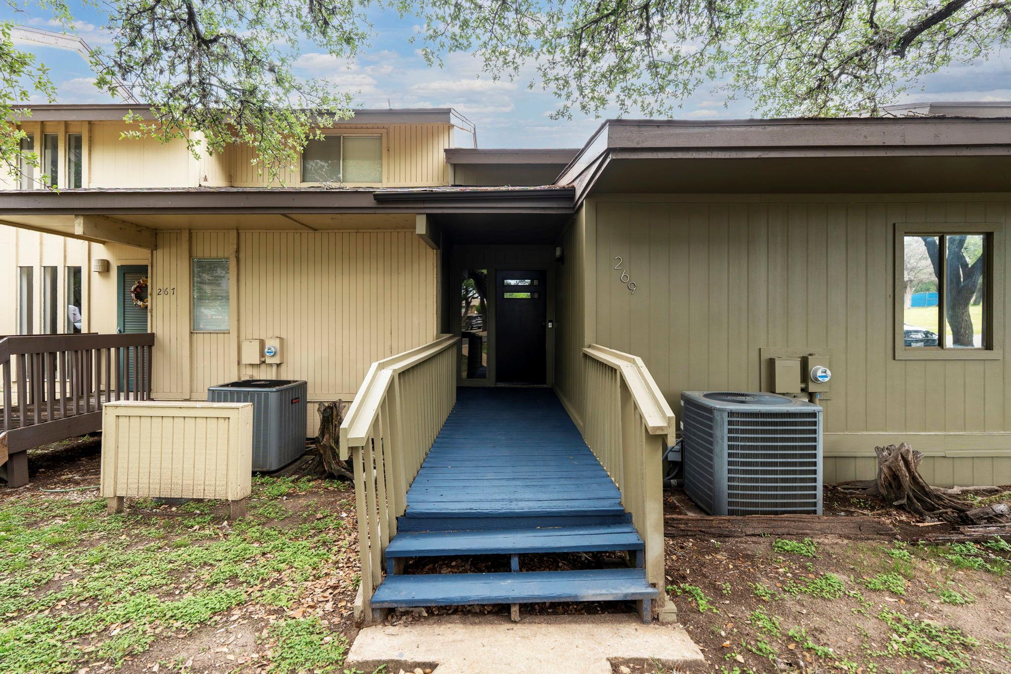 A welcoming accessible ramp leads to this multi-u