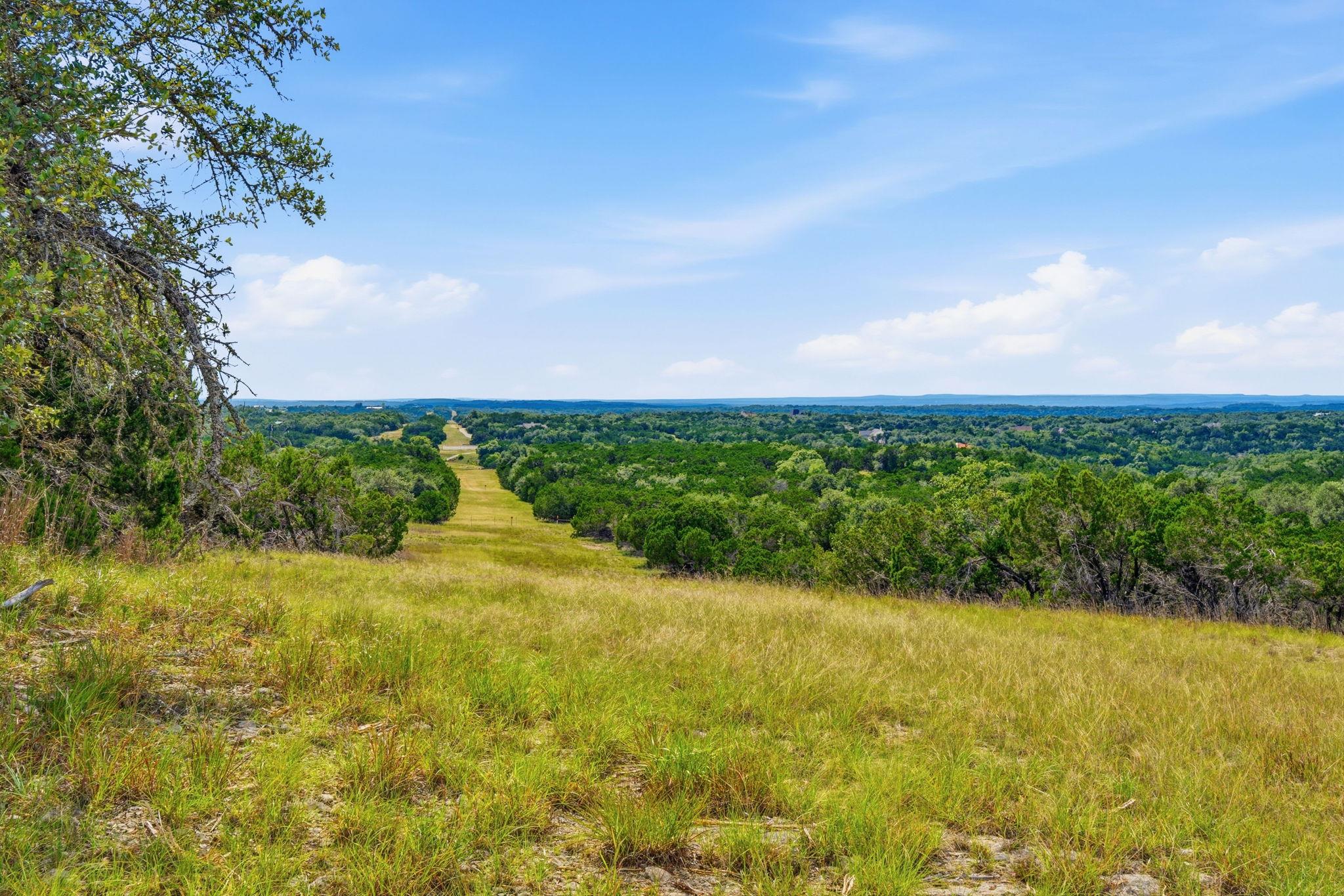 A rolling landscape offers serene views, framed b
