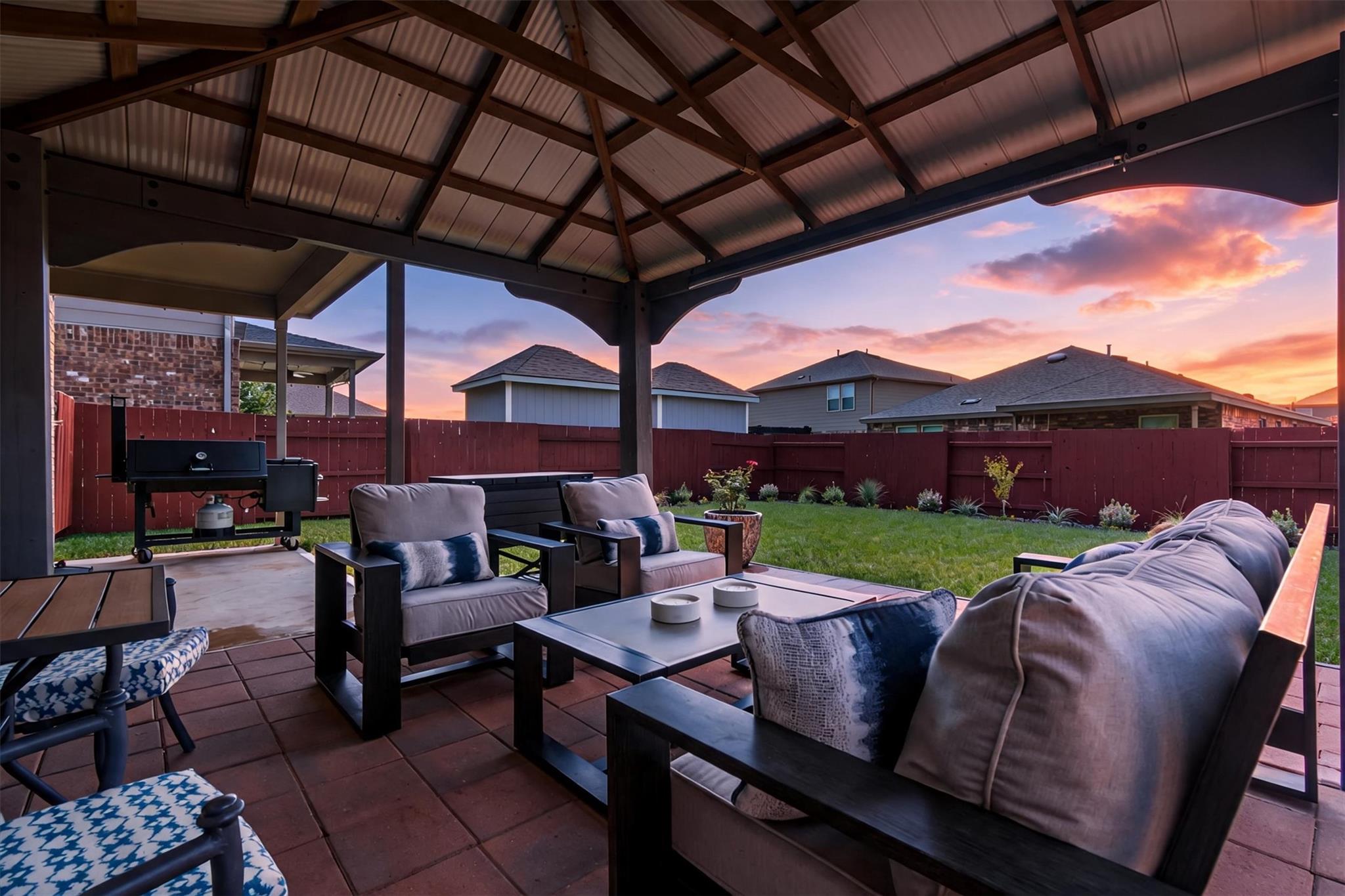 Unwind under a spacious covered patio, perfect fo