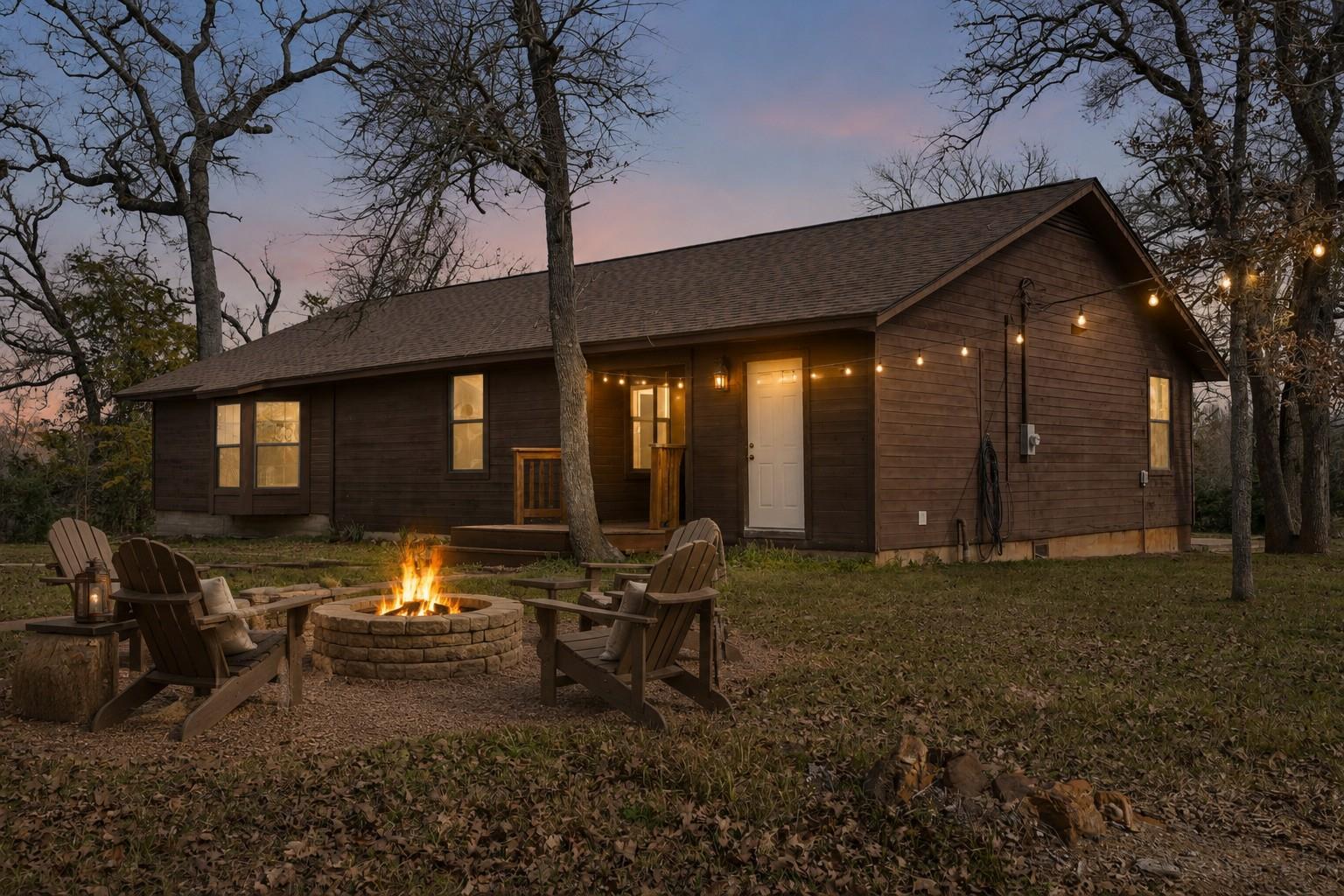 A cozy gathering spot with a brick fire pit perfe