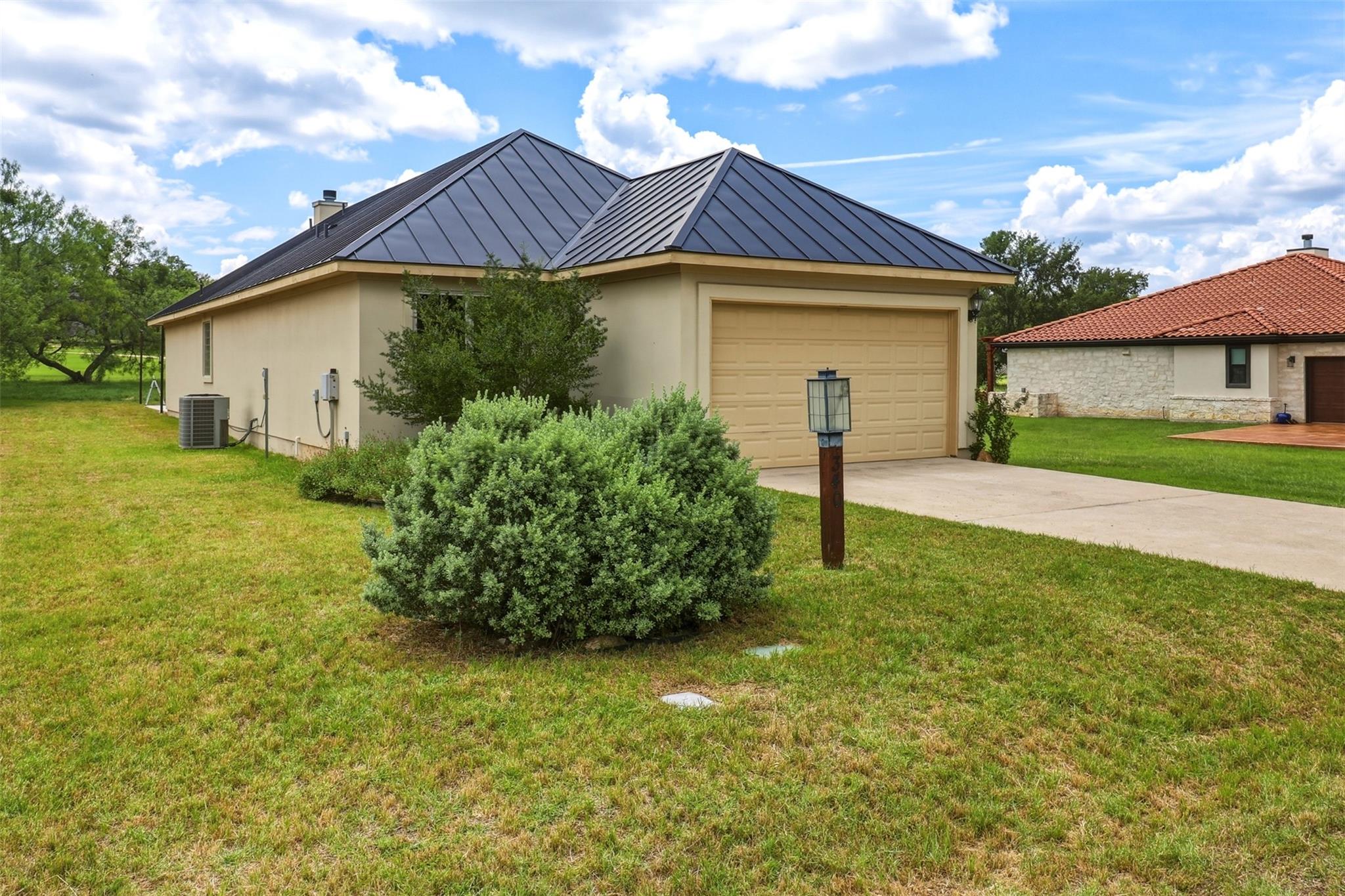 An inviting exterior with a well-maintained lawn 