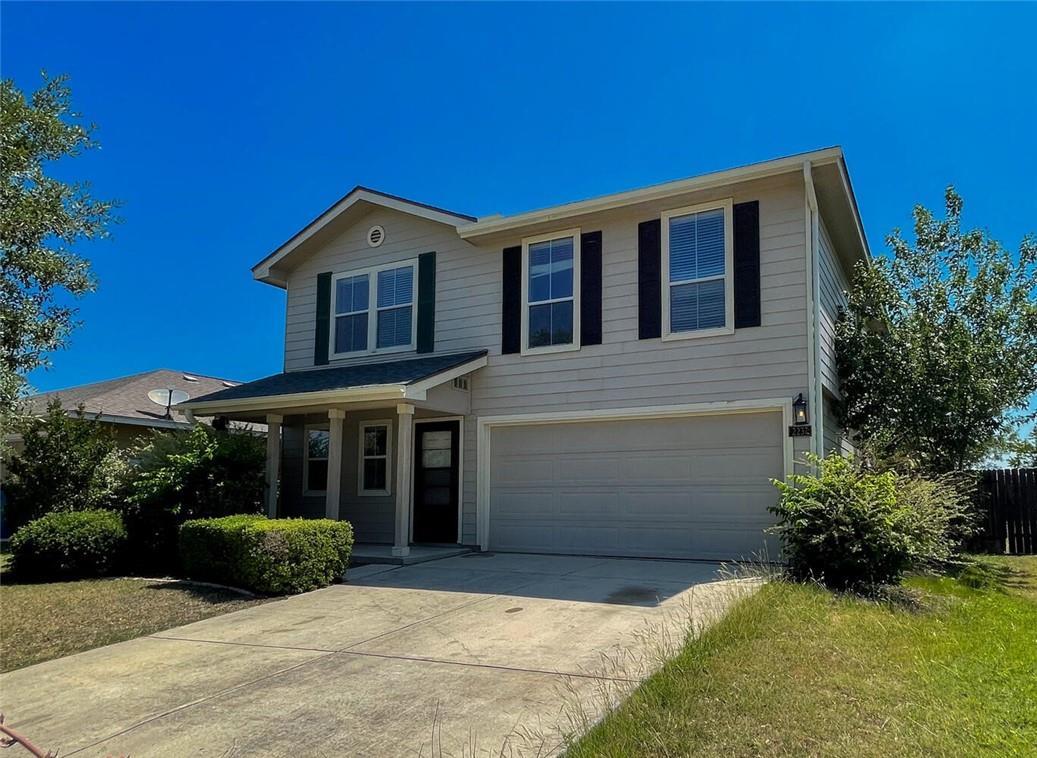 A classic two-story exterior showcases symmetry a