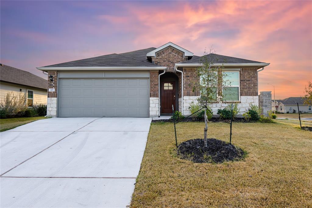 A classic brick and stone facade welcomes you to 