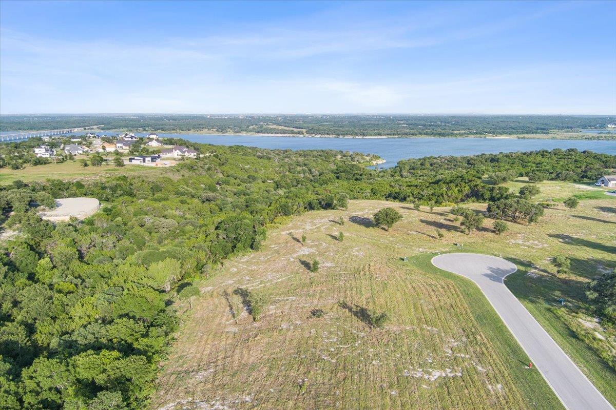 A tranquil lakefront panorama offers views of dis
