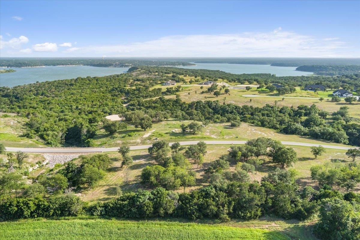 Discover vast, rolling acreage with serene waterf