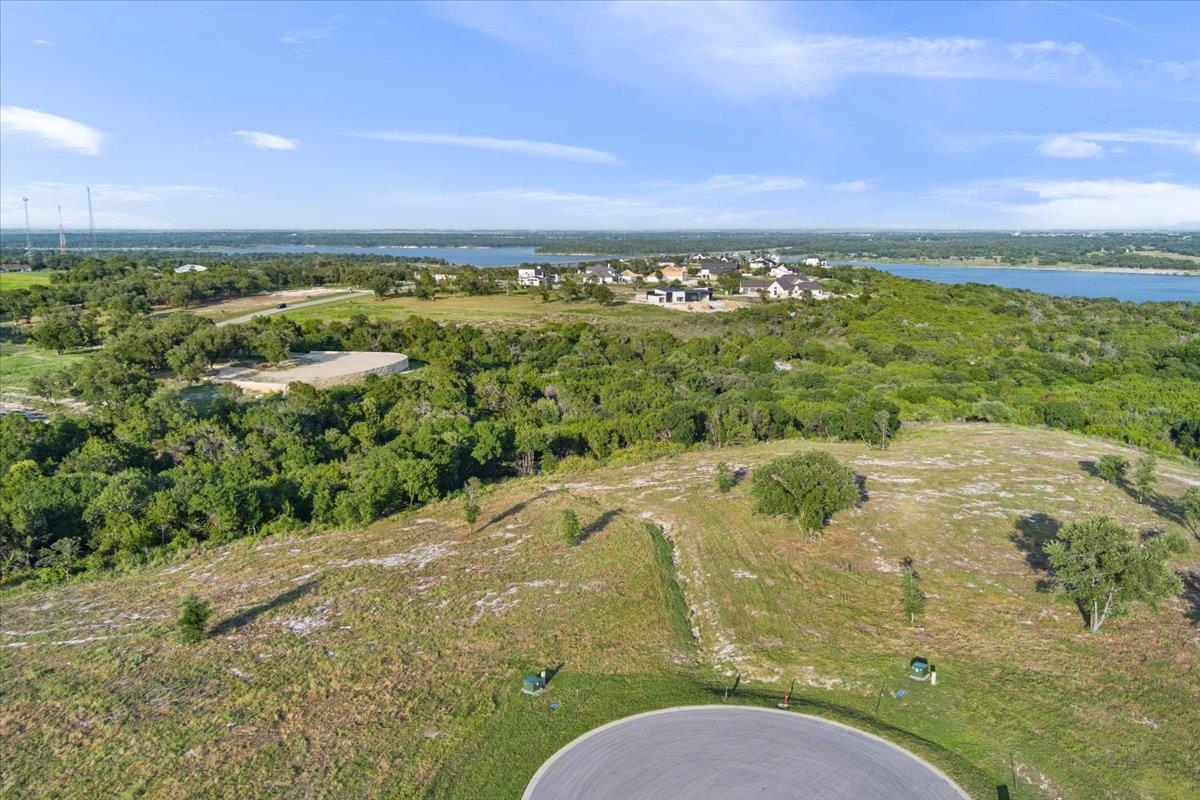 A tranquil vista unfolds across rolling hills, ov