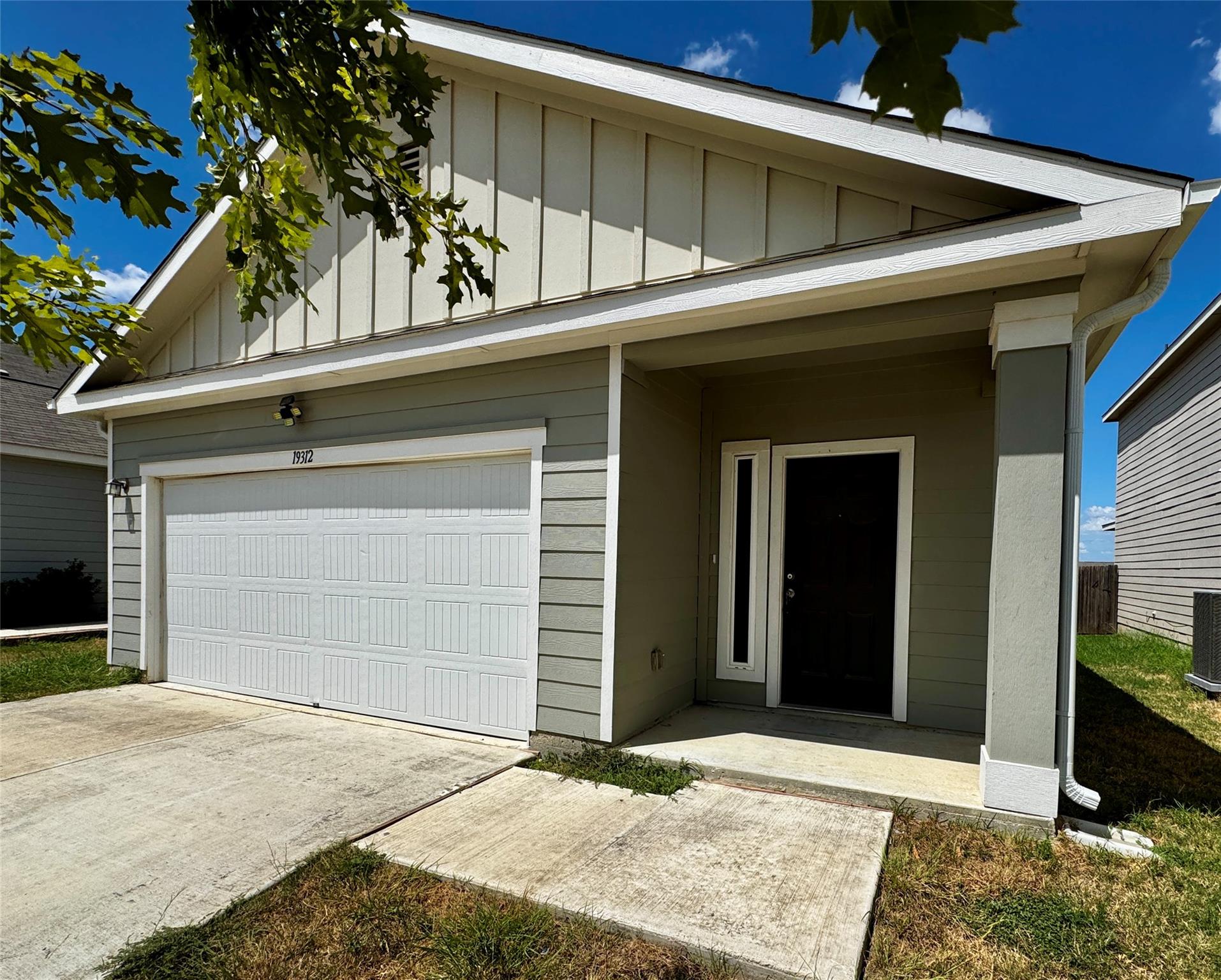 Board and batten accents define the exterior of t
