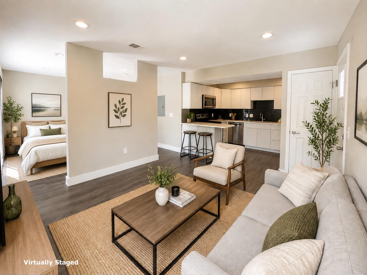 An open concept floorplan seamlessly connects a m