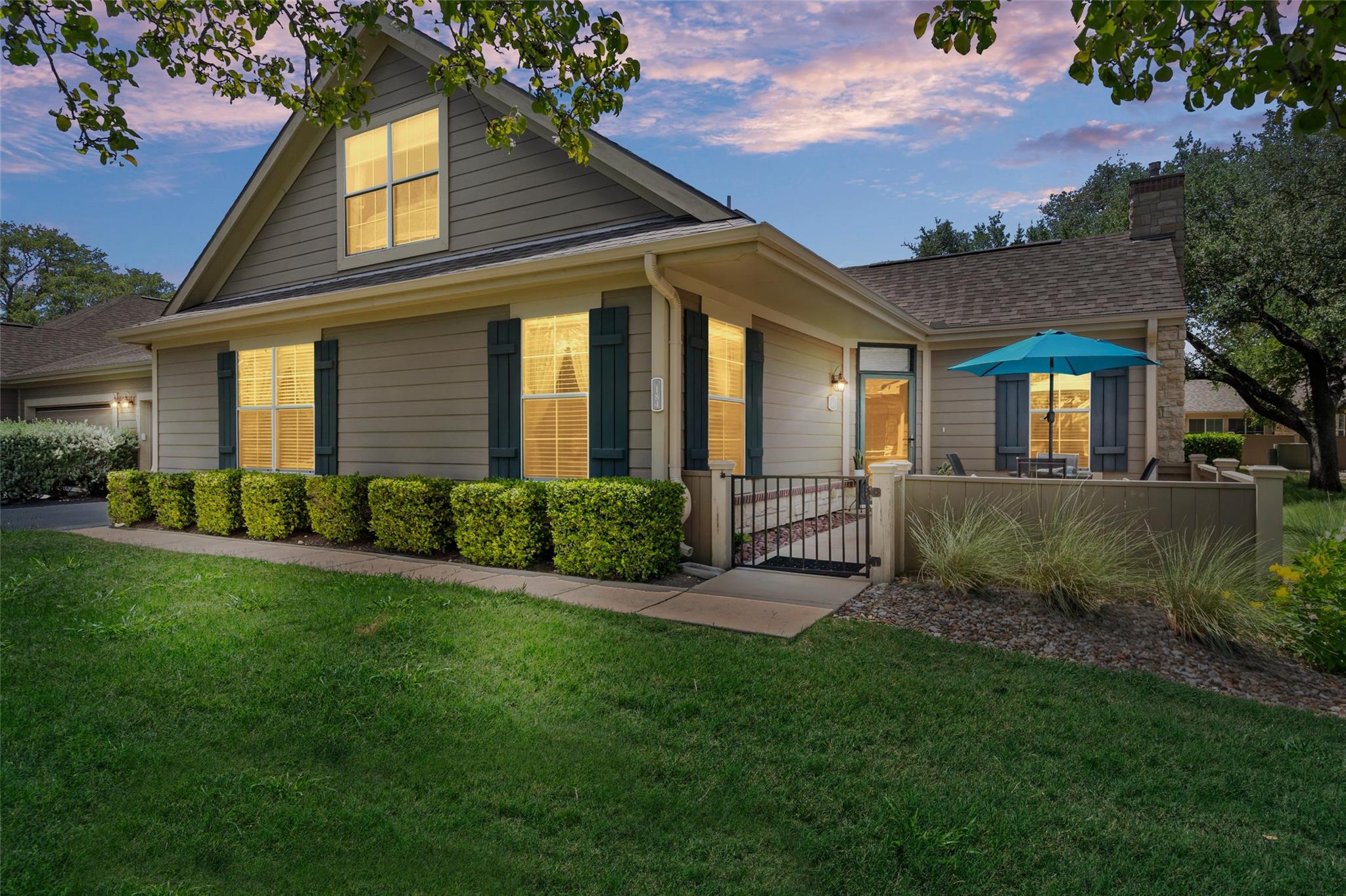 A well-maintained residence featuring neat landsc