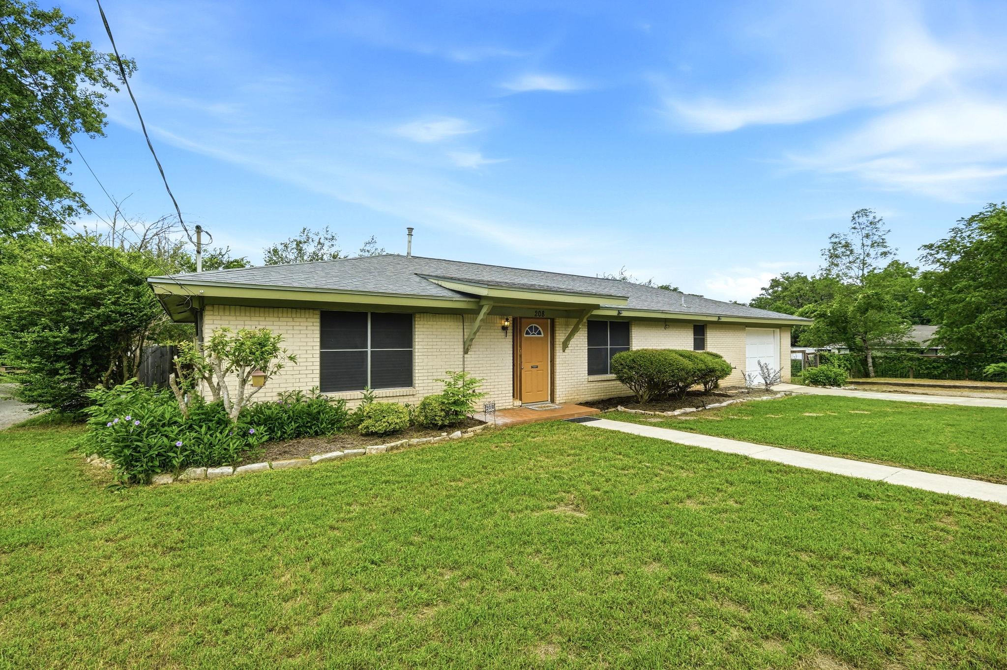 A well-maintained ranch-style home featuring a br