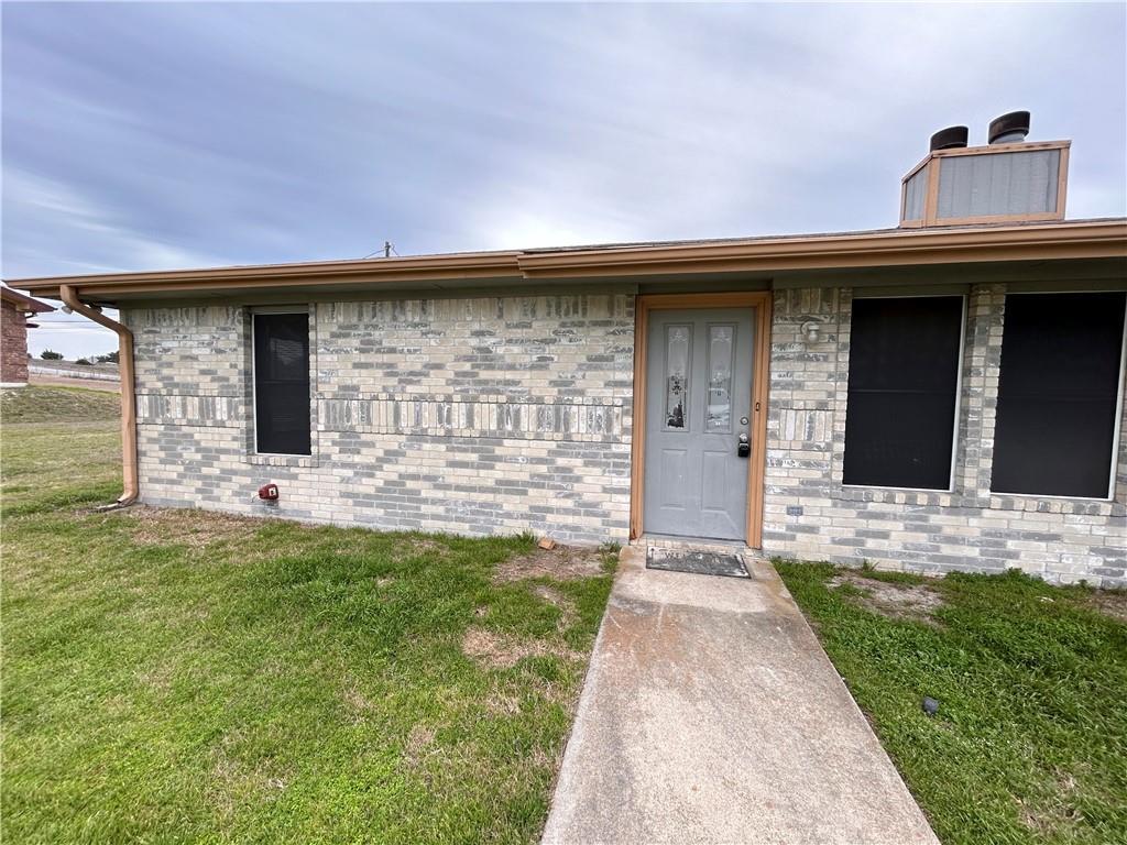 A classic brick exterior offers timeless curb app