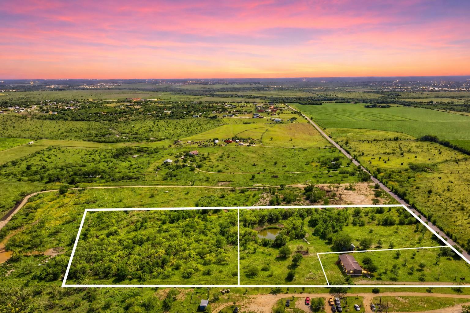 A tranquil rural landscape unfolds with vibrant g