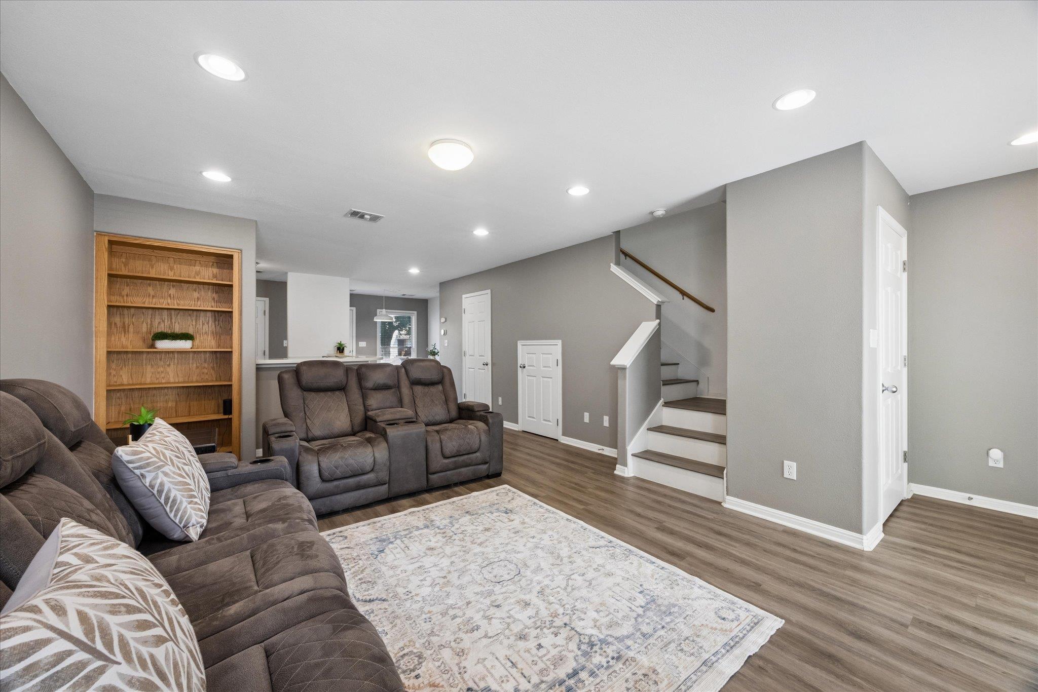 Streamlined living room with modern flooring and 