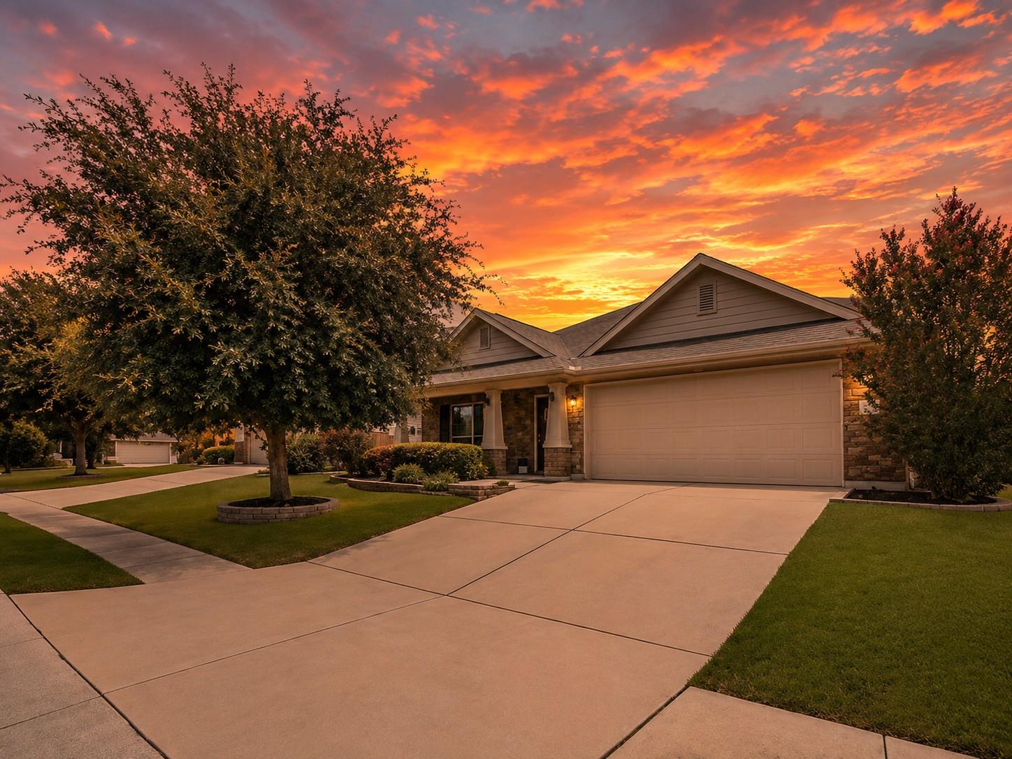 Golden hour glows upon this welcoming residence w