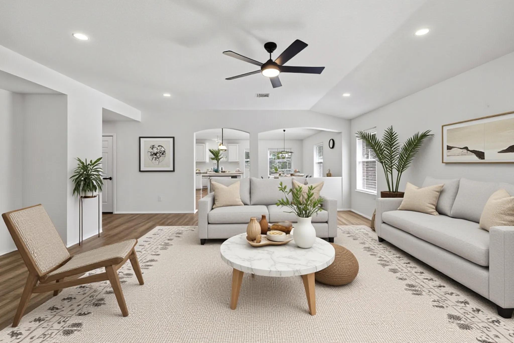 An airy living area with recessed lighting seamle