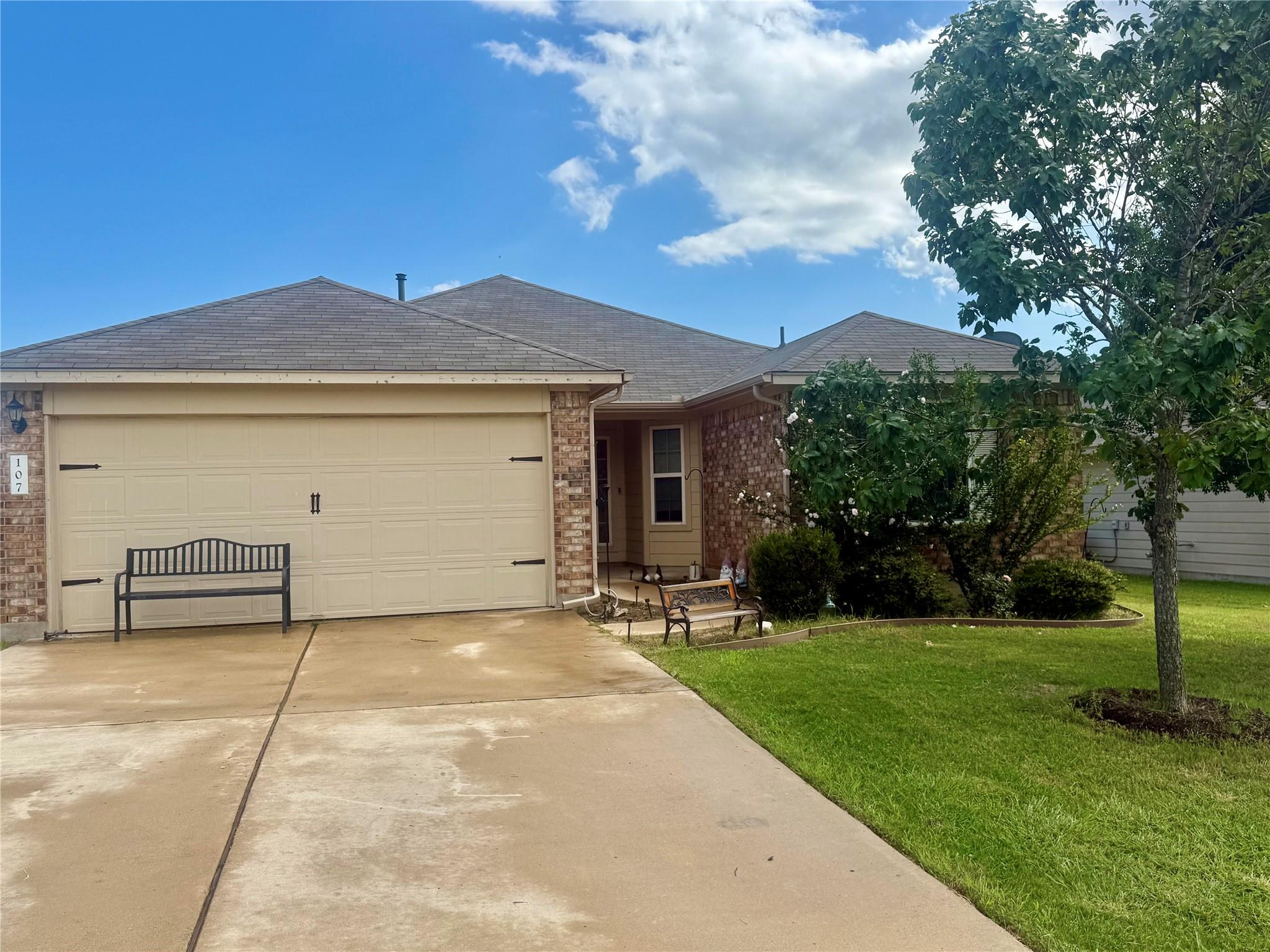 A classic brick exterior offers charm and curb ap