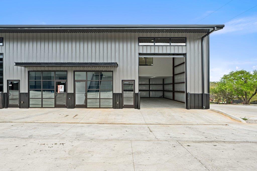 A modern commercial building facade with a large 