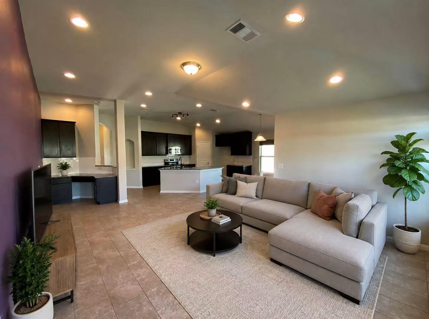 An open floorplan seamlessly connects the living 