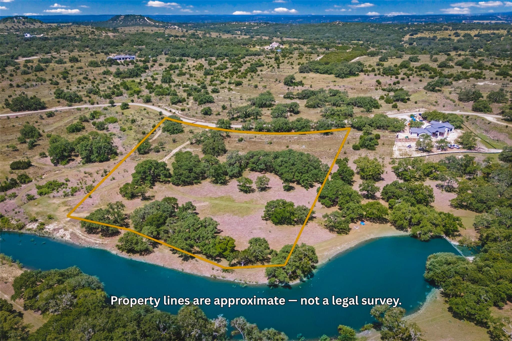 A tranquil waterfront lot awaits, offering a scen