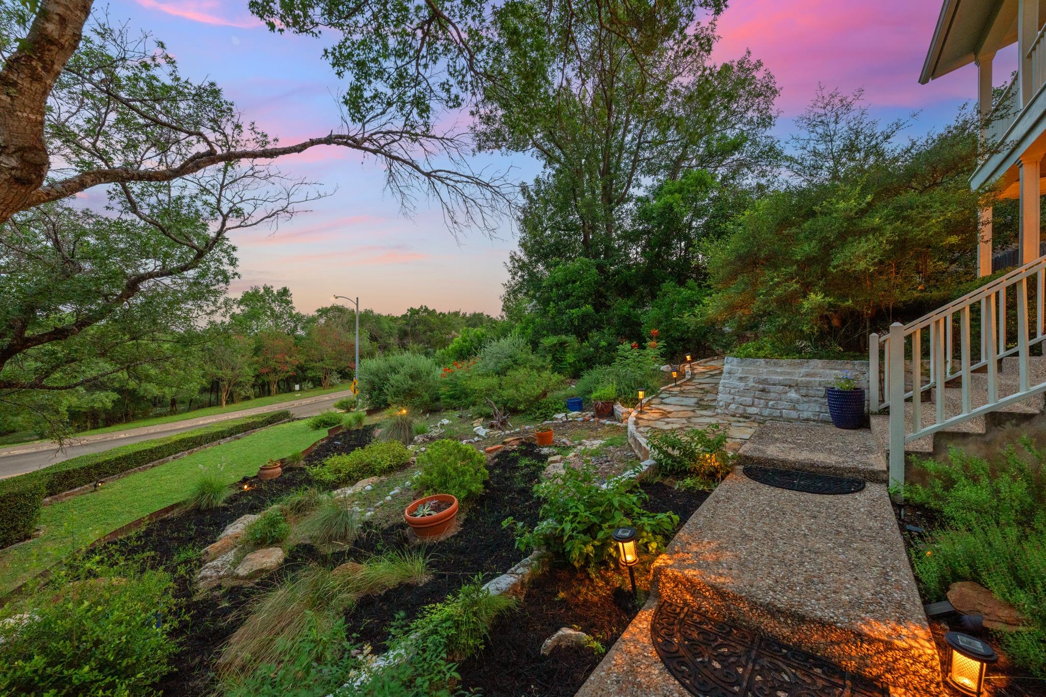 An inviting stone pathway with subtle lighting le
