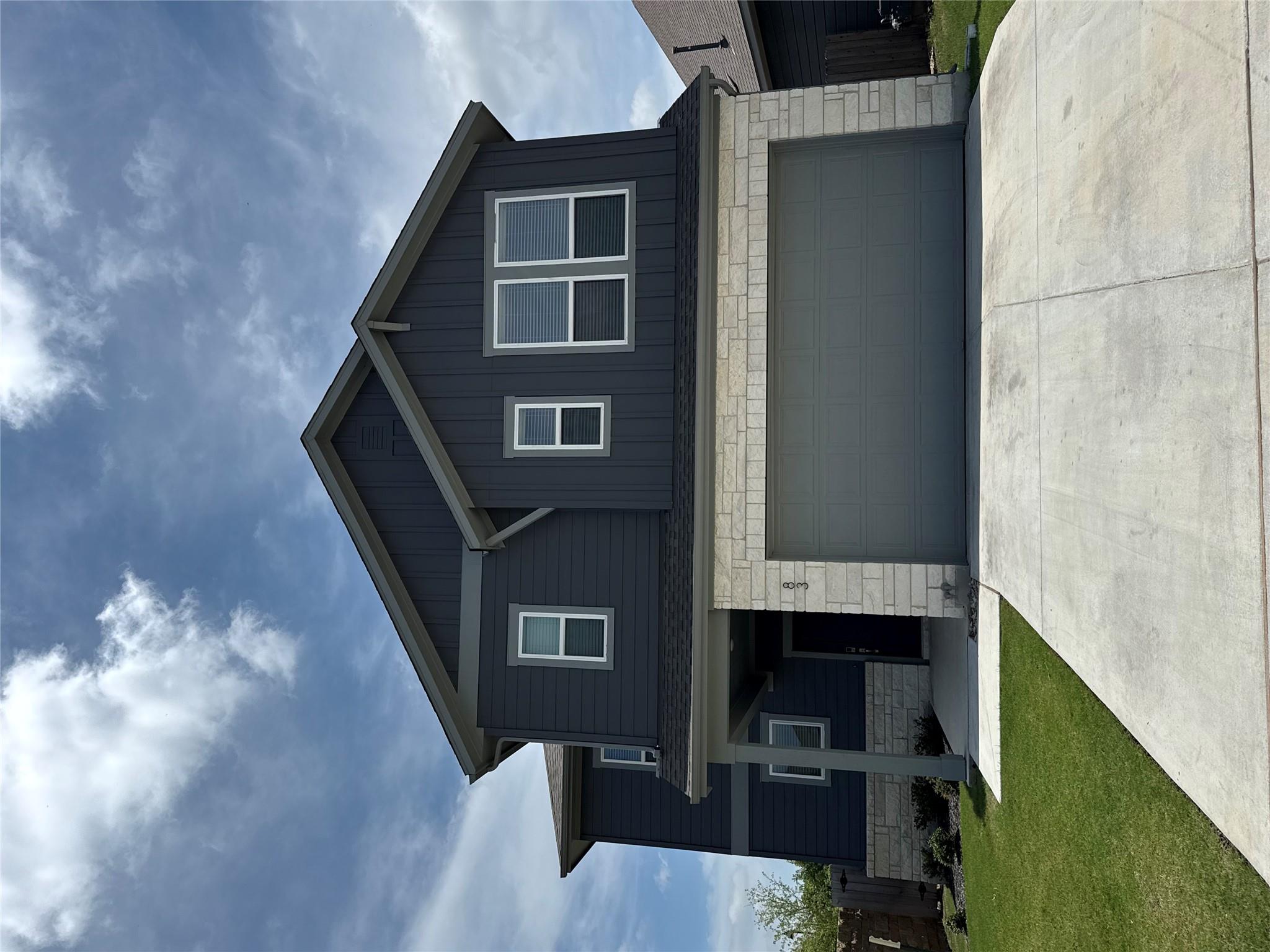 A stylish contemporary exterior presents a striki