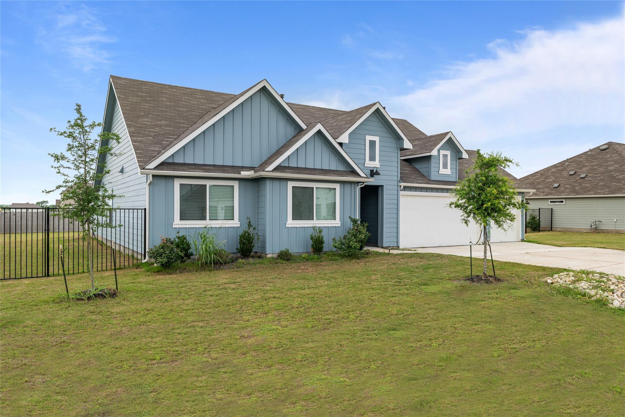 A welcoming facade with a well-maintained lawn an