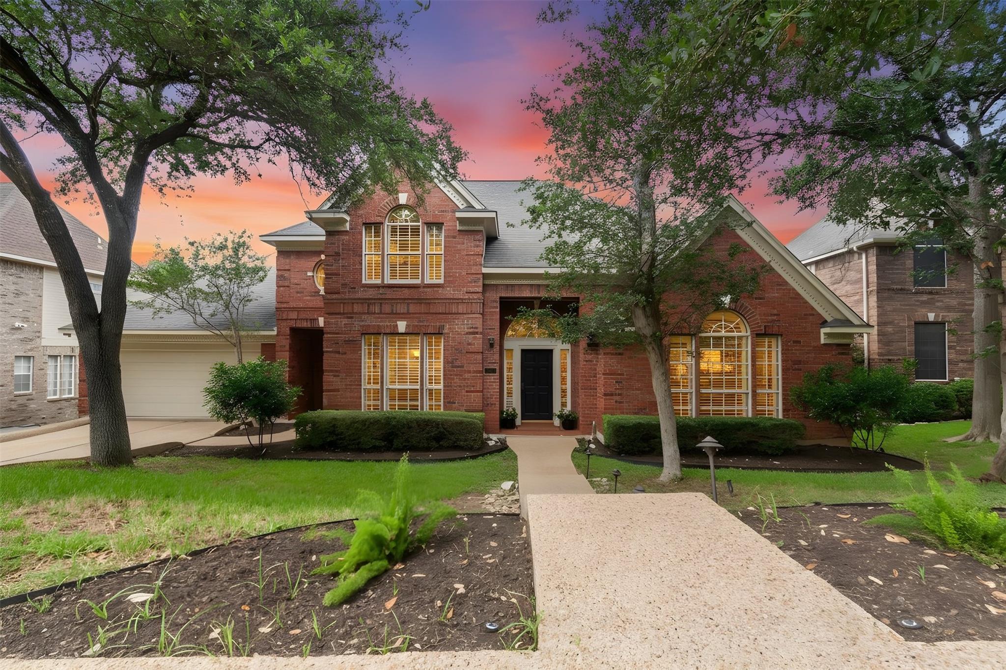 A classic brick exterior with elegant windows and