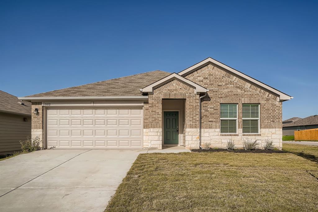 A classic brick and stone facade welcomes you to 