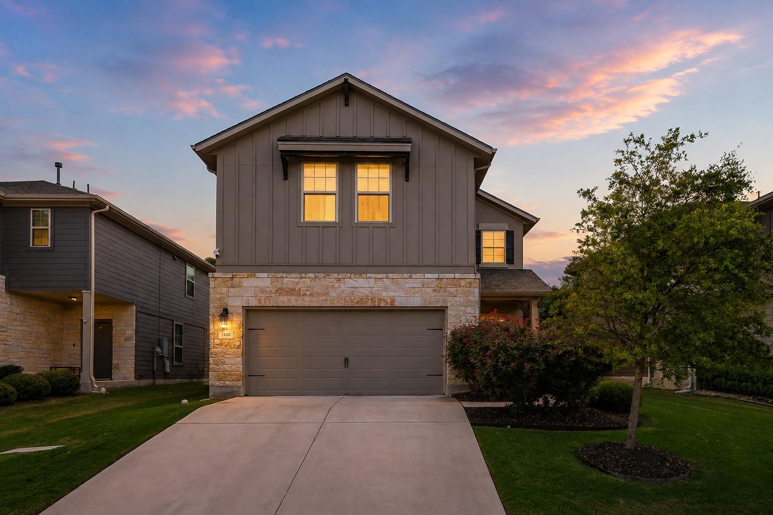 A striking exterior presents a welcoming entryway