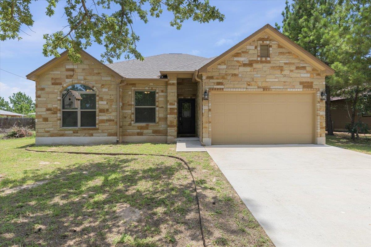 A traditional stone facade enhances the curb appe