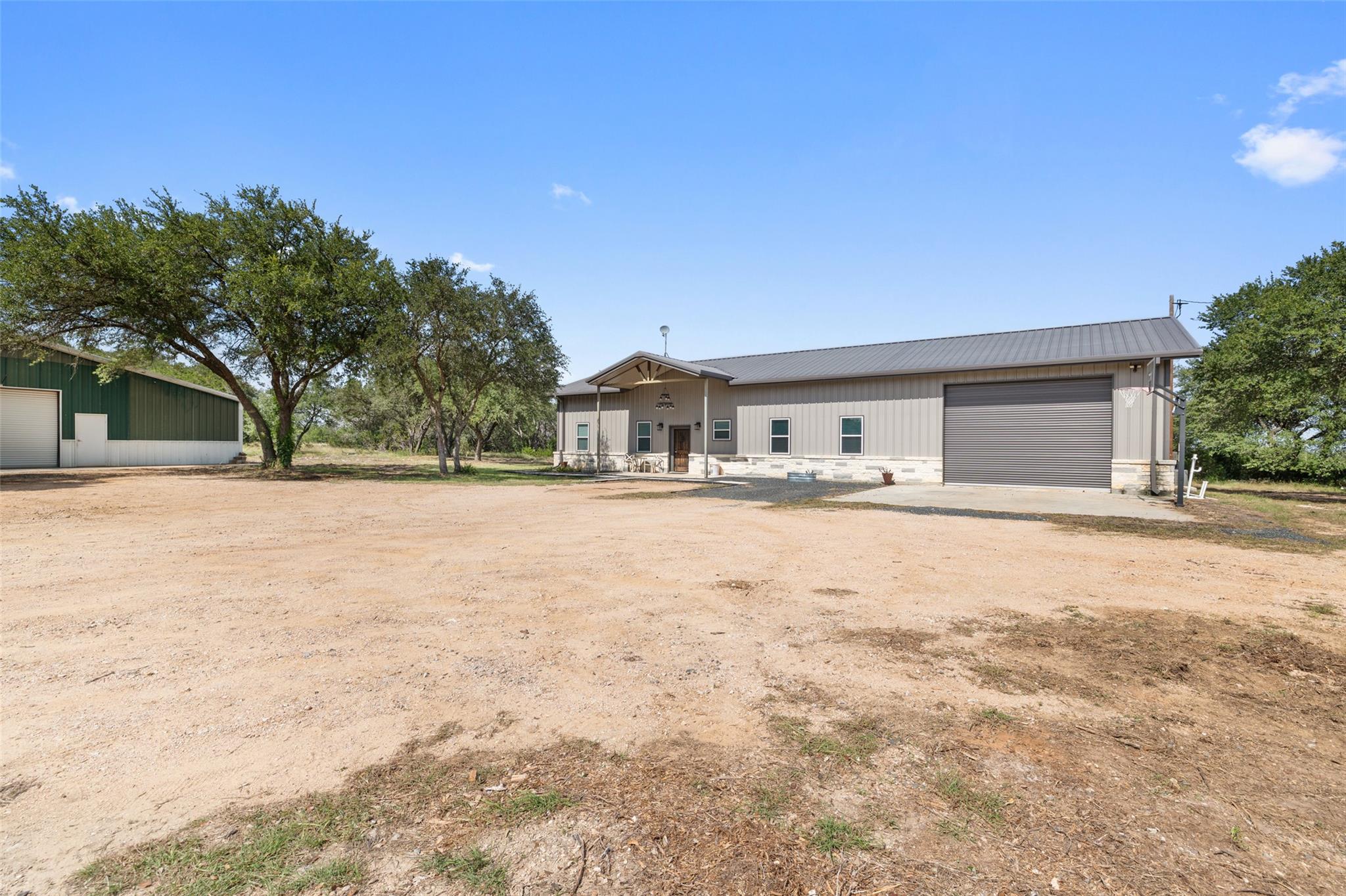 A spacious barndominium features a front entry po