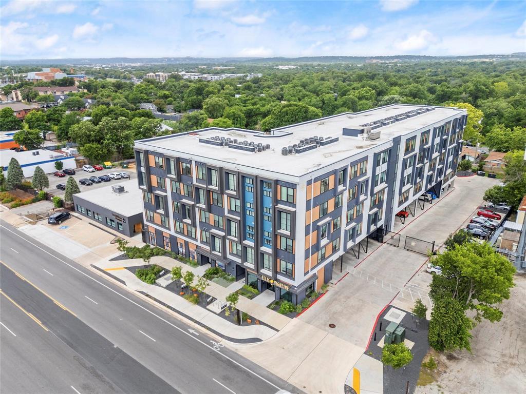 A contemporary multi-story building anchors a vib