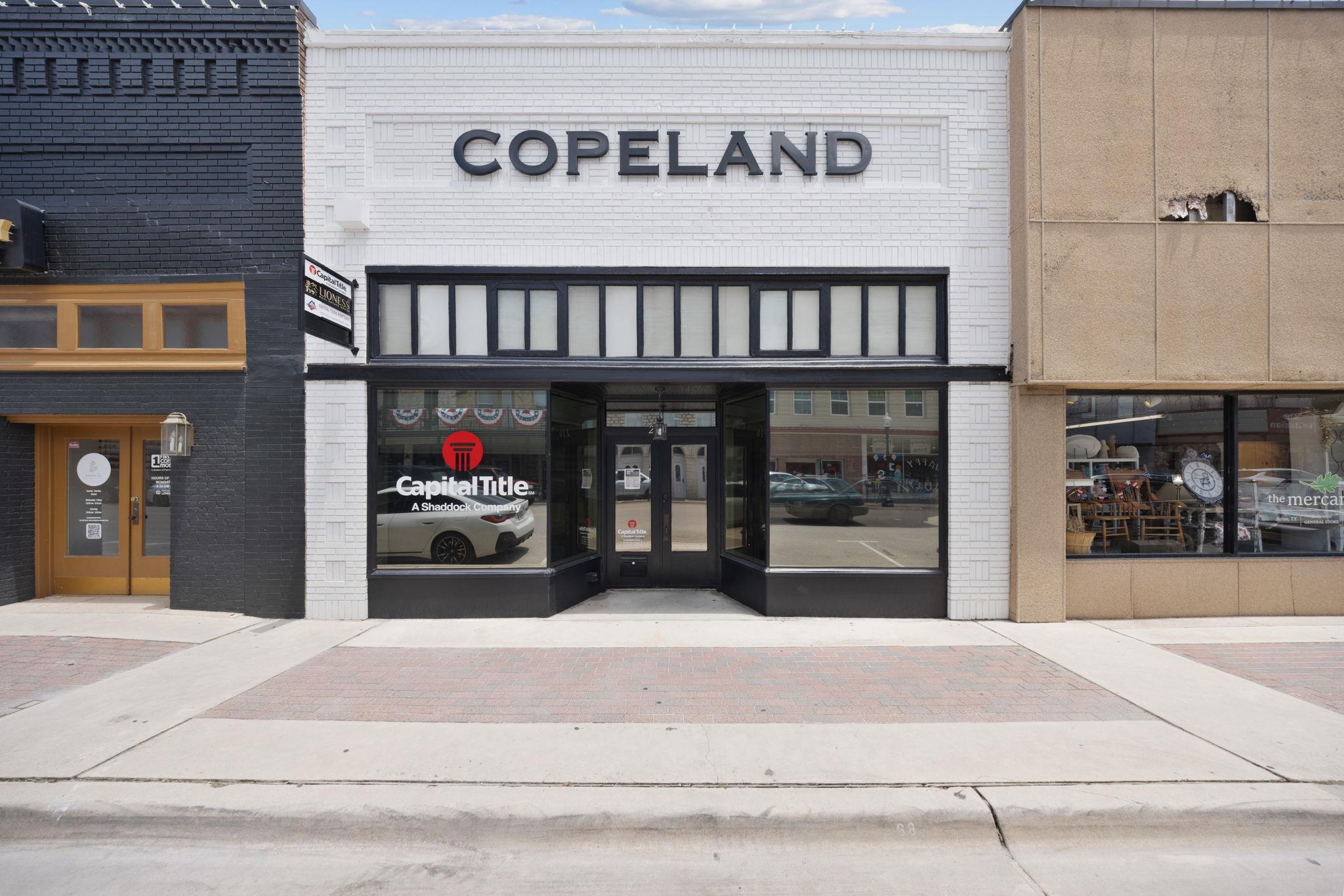 A classic brick building with an inviting entranc