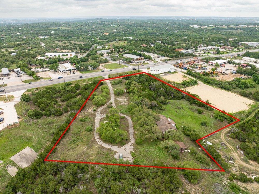 An aerial perspective reveals a vast land parcel 