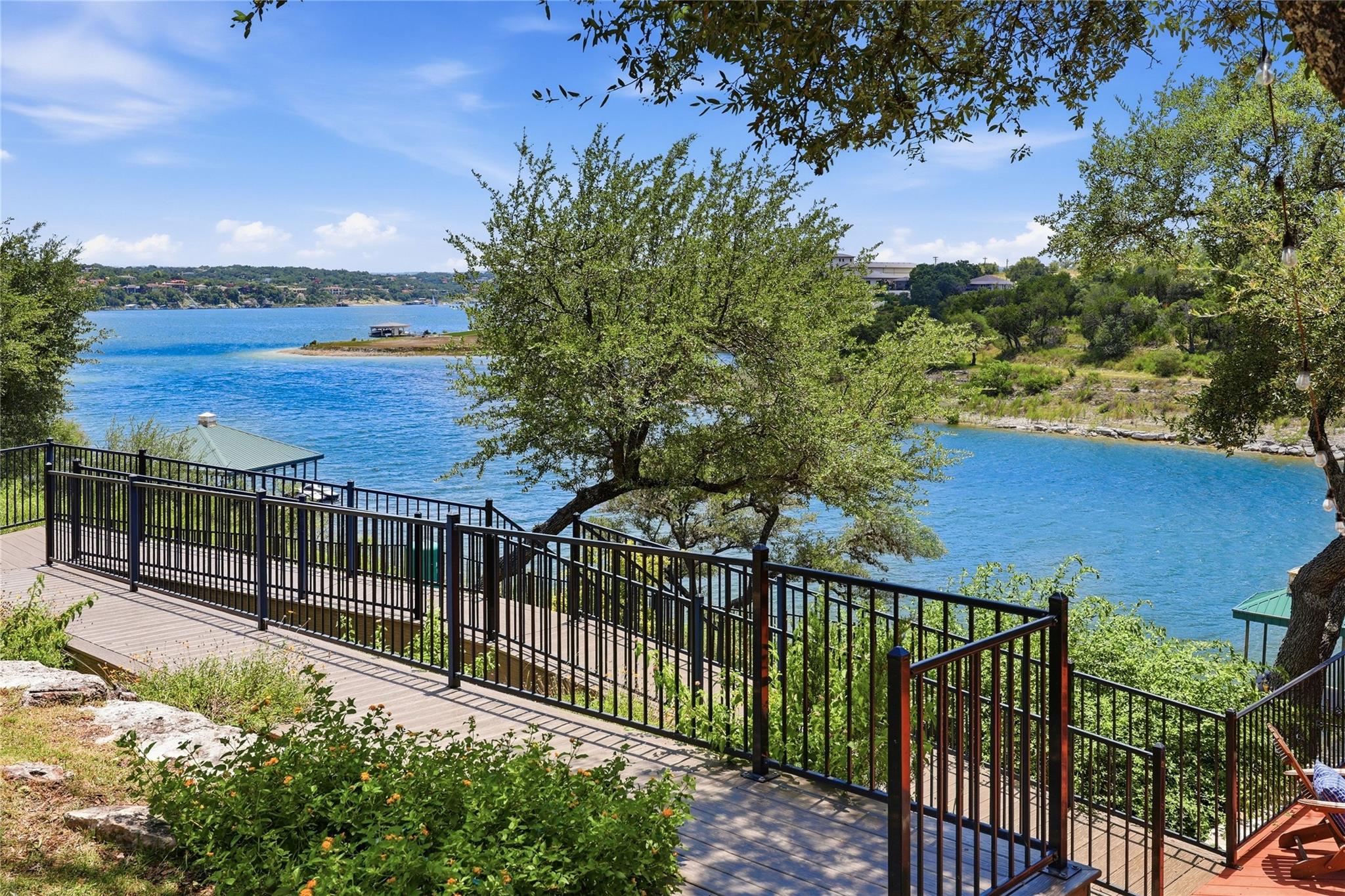 A tranquil lake view from a spacious deck offers 