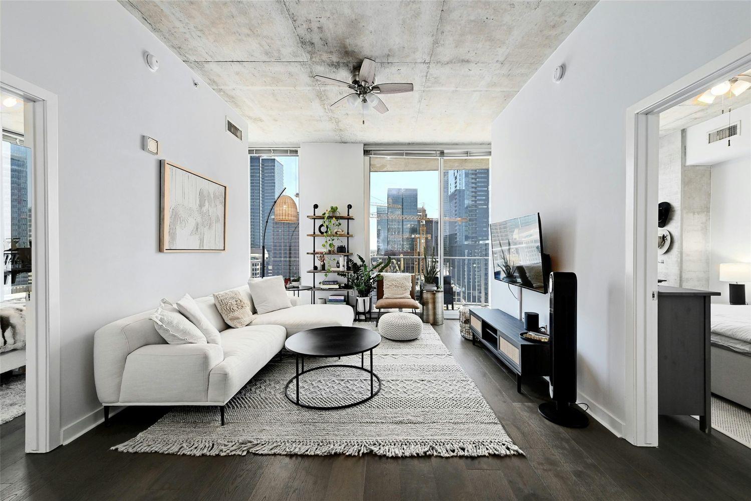 Hardwood floors and industrial concrete ceilings 