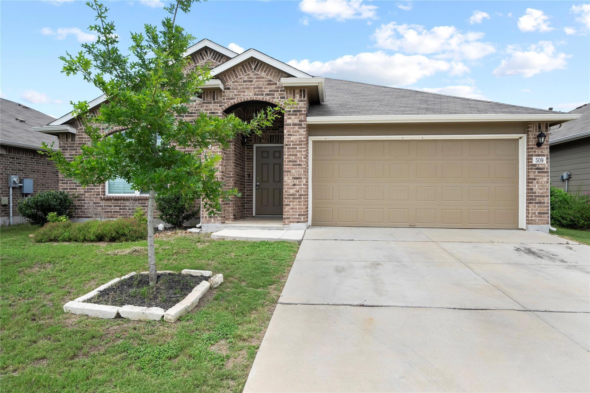 A classic brick exterior offers enduring charm an