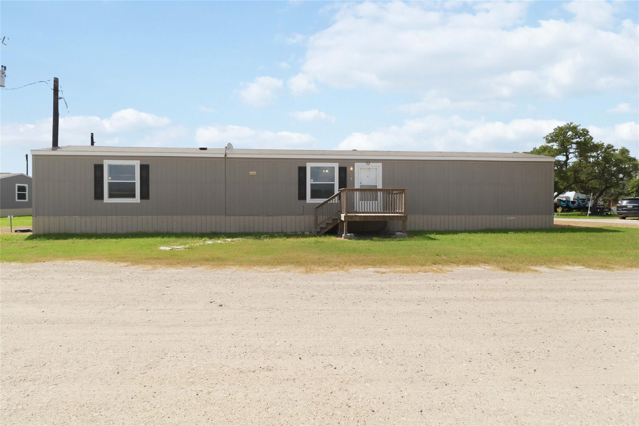 A well-maintained manufactured home with a practi