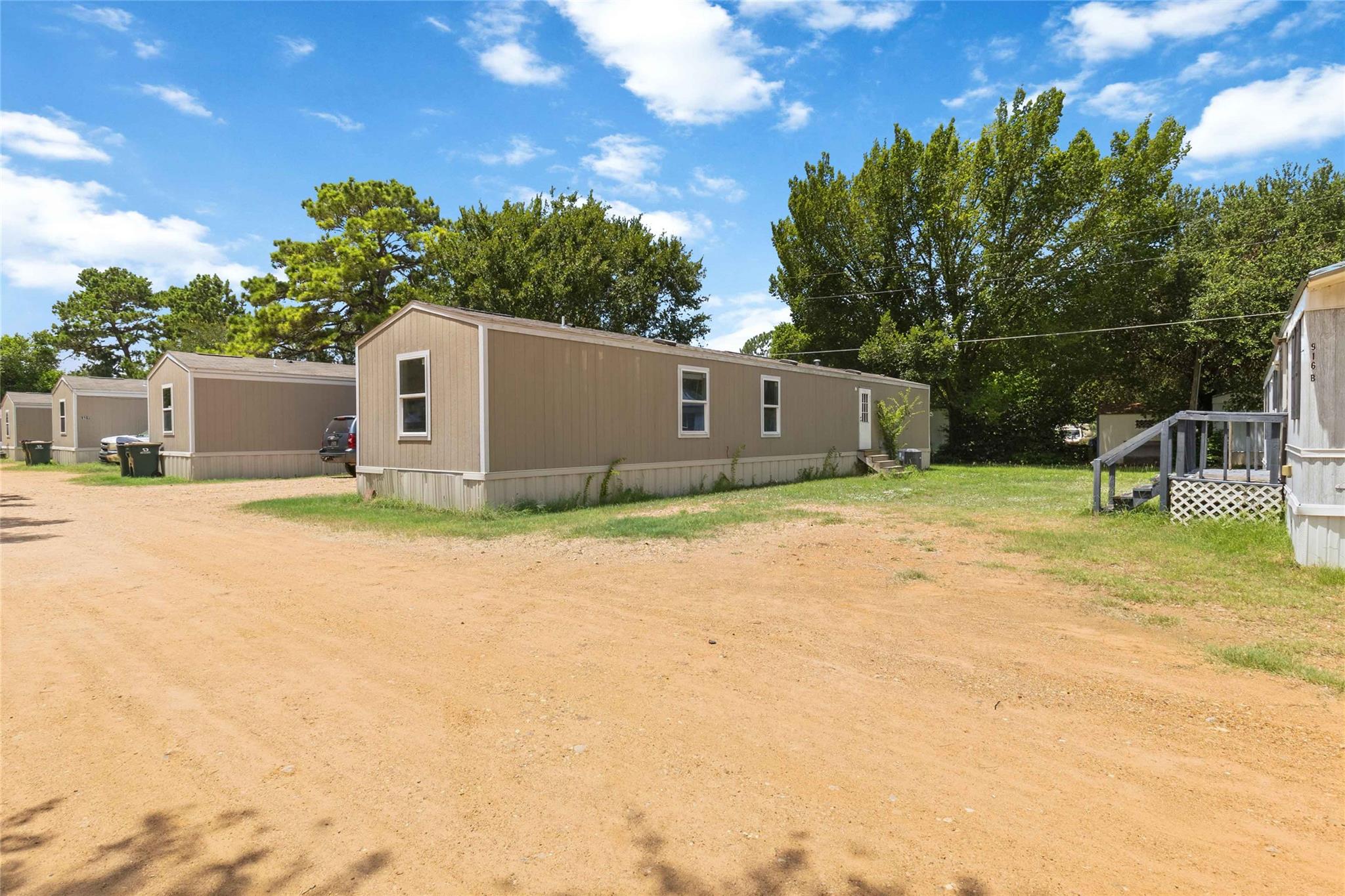 A collection of manufactured homes nestled in a v