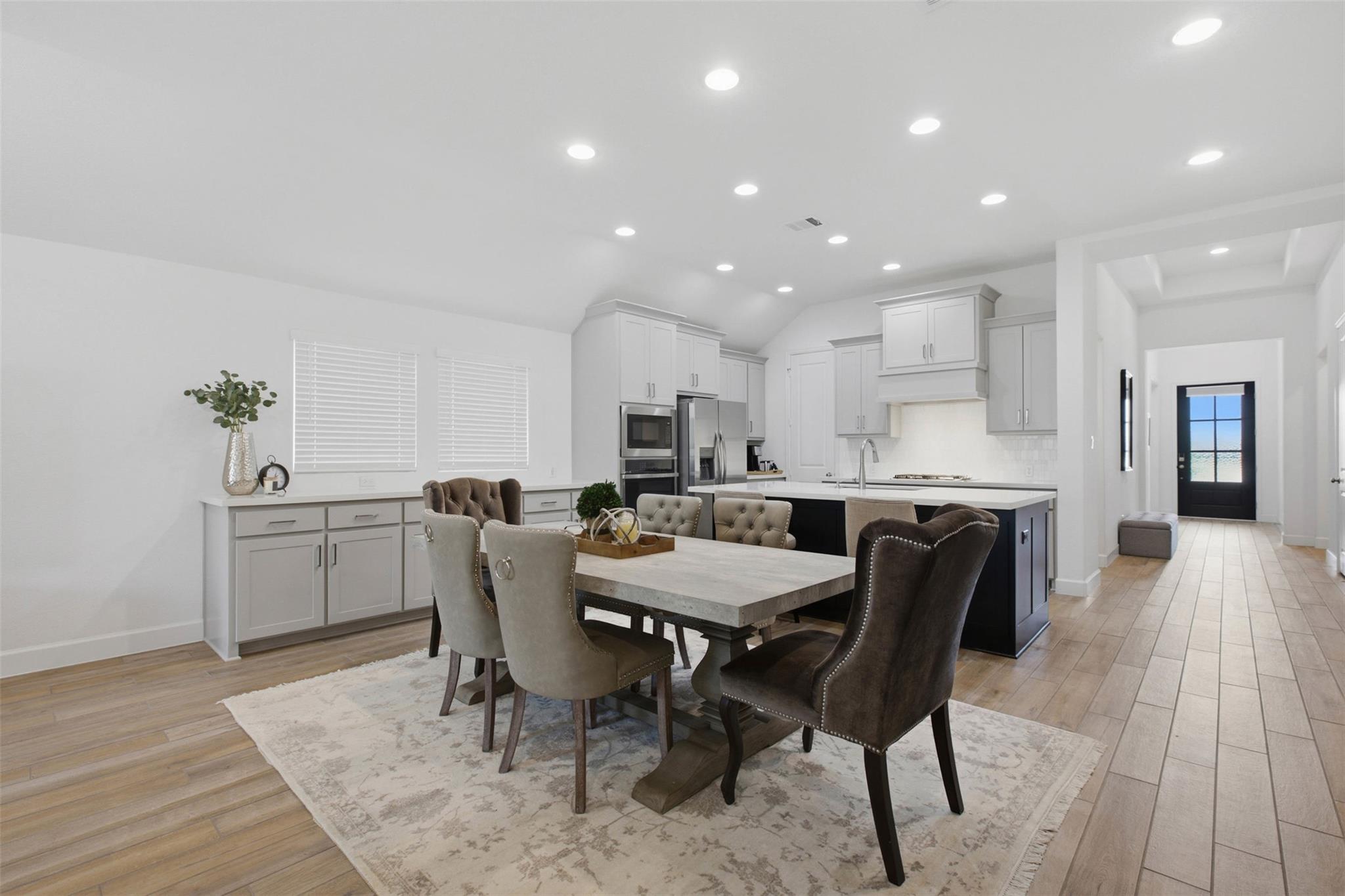 An inviting open floorplan seamlessly connects a 