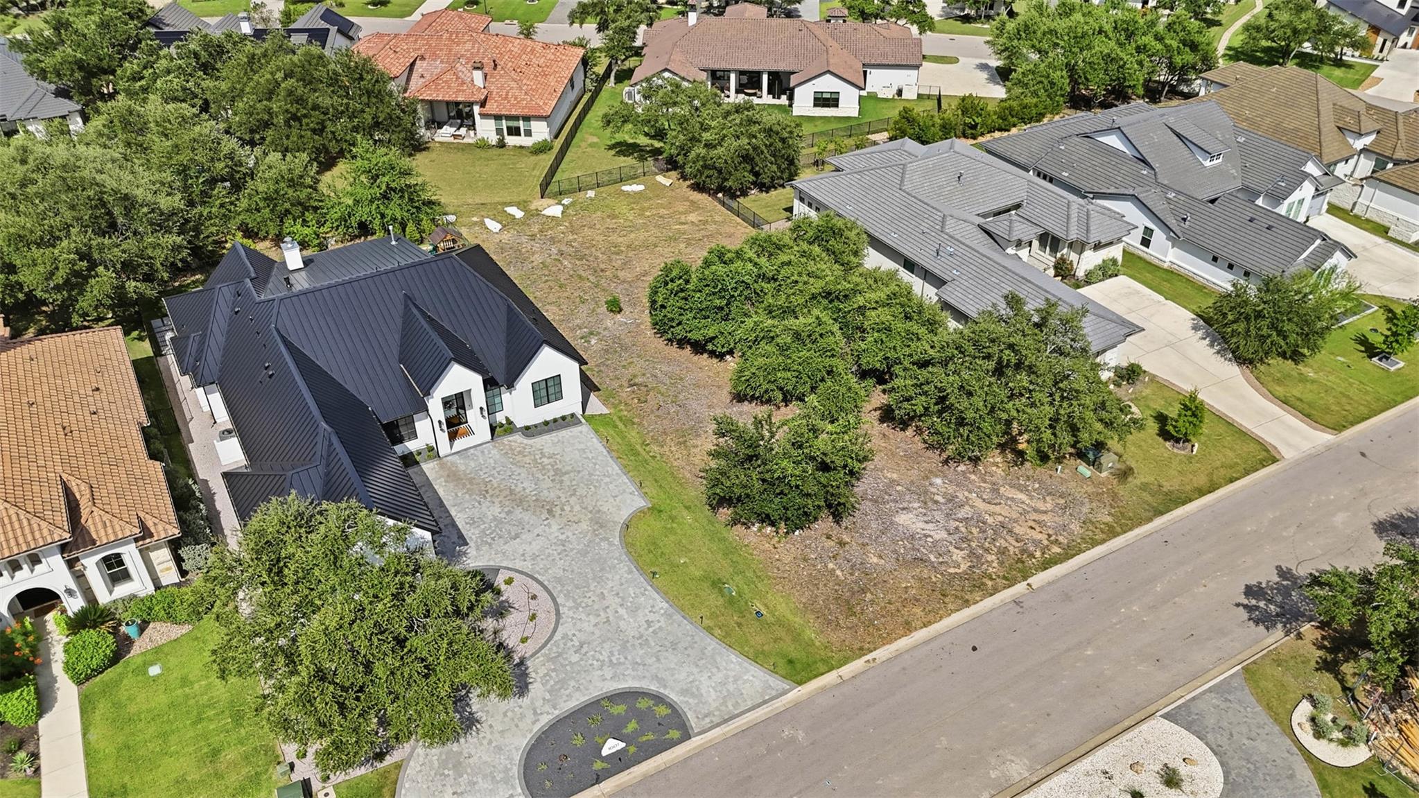 An aerial perspective reveals a modern home with 