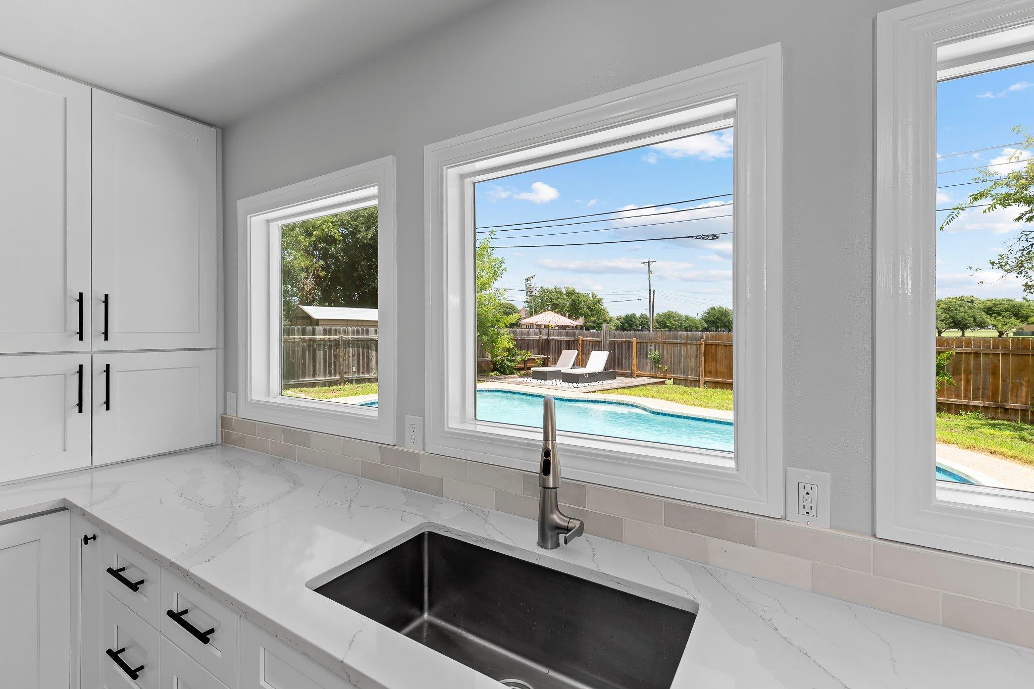 A well-appointed kitchen offers a refreshing view