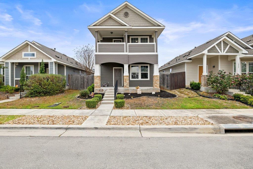 Craftsman-style house featuring covered porch and