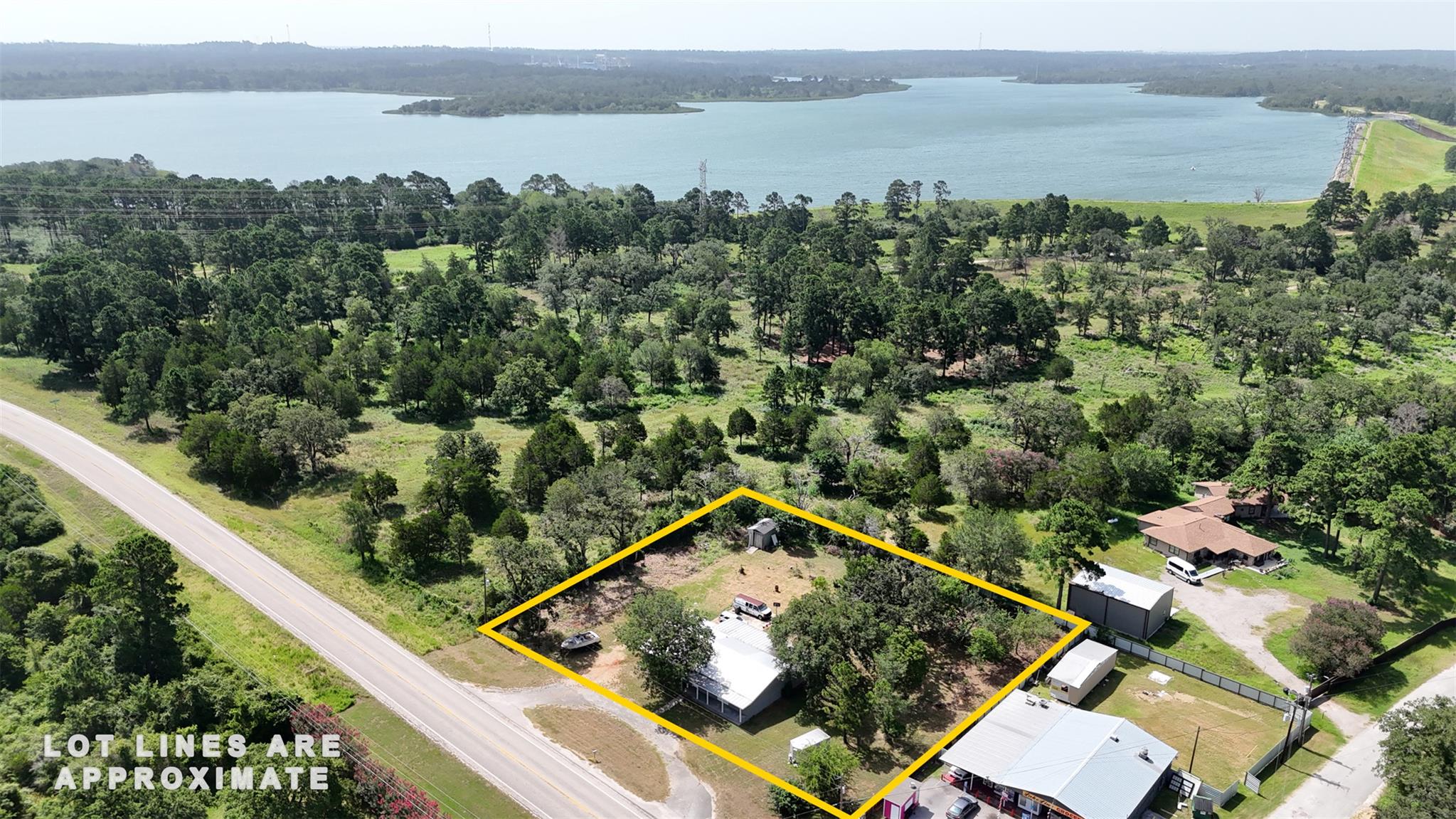 Discover a generous lot nestled among trees with 